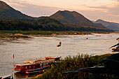 Luang Prabang, Laos - Sunset along the Mekong riverfront.  